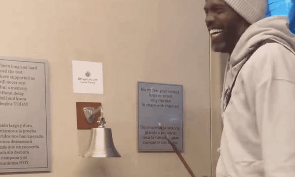 Randy Moss ringing cancer bell