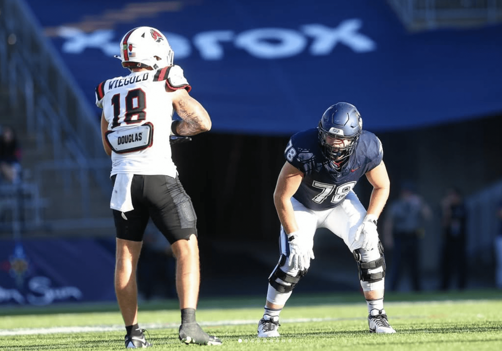 WVU Football OL Cameron Griffin with UConn
