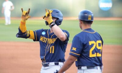 Sam White celebrates getting on-base against UNC on June 7, 2024 at Boshamer Stadium in Chapel Hill, N.C. in the NCAA Tournament Super Regionals. (Mitchell Northam / WV Sports Now)