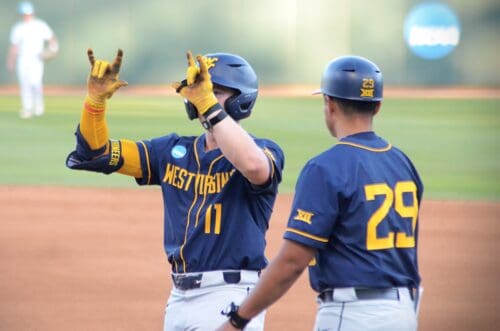 Sam White celebrates getting on-base against UNC on June 7, 2024 at Boshamer Stadium in Chapel Hill, N.C. in the NCAA Tournament Super Regionals. (Mitchell Northam / WV Sports Now)