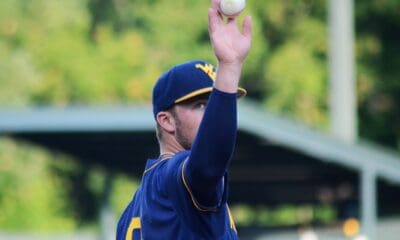 WVU Baseball Grant Hussey tosses a ball away as WVU played against North Carolina on June 8, 2024, in the Super Regionals of the NCAA Tournament at Boshamer Stadium in Chapel Hill, N.C. (Mitchell Northam / WV Sports Now)