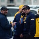 WVU fans tailgate ahead of the Duke's Mayo Bowl against North Carolina on Wednesday, Dec. 27, 2023 in Charlotte, N.C. (Mitchell Northam / WV Sports Now)