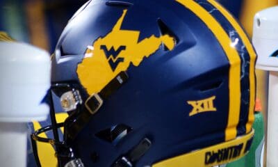 A WVU Football helmet rests on the sidelines at the Duke's Mayo Bowl on Dec. 27, 2023 at Bank of America Stadium in Charlotte, N.C. (Mitchell Northam / WV Sports Now)