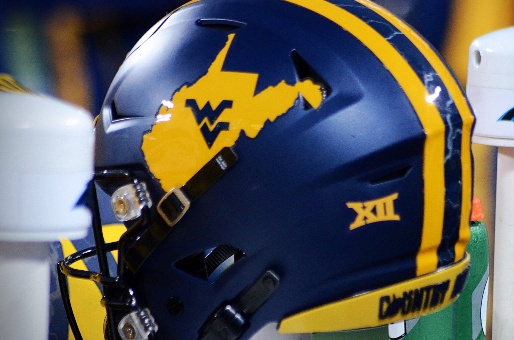 A WVU Football helmet rests on the sidelines at the Duke's Mayo Bowl on Dec. 27, 2023 at Bank of America Stadium in Charlotte, N.C. (Mitchell Northam / WV Sports Now)