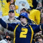 WVU football fans cheer at the Duke's Mayo Bowl on Dec. 27, 2023 at Bank of America Stadium in Charlotte, N.C. (Mitchell Northam / WV Sports Now)
