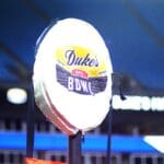 The down marker carries the logo of the Duke's Mayo Bowl on Dec. 27, 2023 at Bank of America Stadium in Charlotte, N.C. (Mitchell Northam / WV Sports Now)