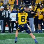 WVU Football quarterback Garrett Greene drops back against UNC in the Duke's Mayo Bowl at Bank of America Stadium in Charlotte, N.C. on Dec. 27, 2023. (Mitchell Northam / WV Sports Now)
