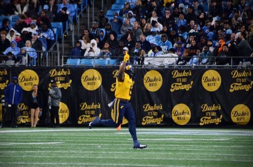 WVU Football linebacker Tyrin Bradley celebrates his third quarter interception against UNC at the Duke's Mayo Bowl on Dec. 27, 2023, at Bank of America Stadium in Charlotte, N.C. (Mitchell Northam / WV Sports Now)