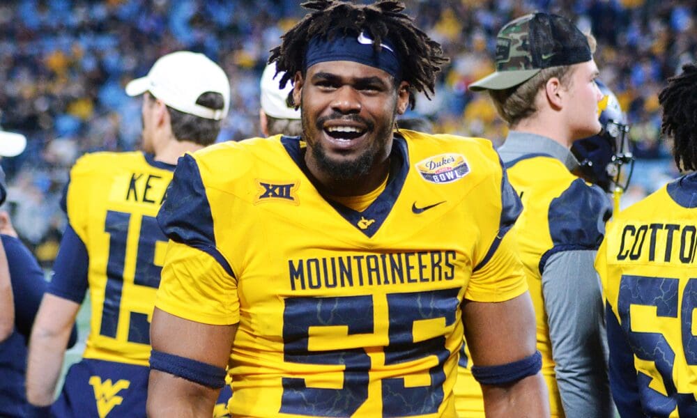 WVU Football DL Davoan Hawkins gets hype on the sidelines at the Duke's Mayo Bowl on Dec. 27, 2023, at Bank of America Stadium in Charlotte, N.C. (Mitchell Northam / WV Sports Now)