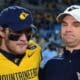 WVU Football quarterback Garrett Greene and head coach Neal Brown after beating UNC in the Duke's Mayo Bowl at Bank of America Stadium in Charlotte, N.C. on Dec. 27, 2023. (Mitchell Northam / WV Sports Now)