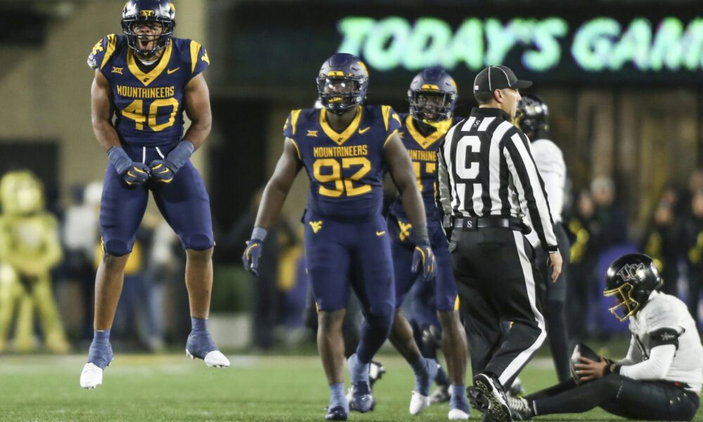 WVU Football LB Josiah Trotter reacts to a big play against UCF