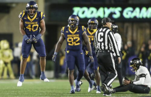 WVU Football LB Josiah Trotter reacts to a big play against UCF