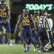 WVU Football LB Josiah Trotter reacts to a big play against UCF