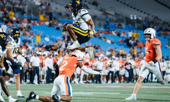 WVU Football QB Michael Hawkins poster play against Virginia