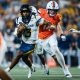 WVU Football QB Michael Hawkins scrmabling against Virginia