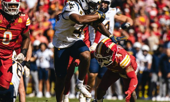 WVU Football RB Cam Cook against Iowa State