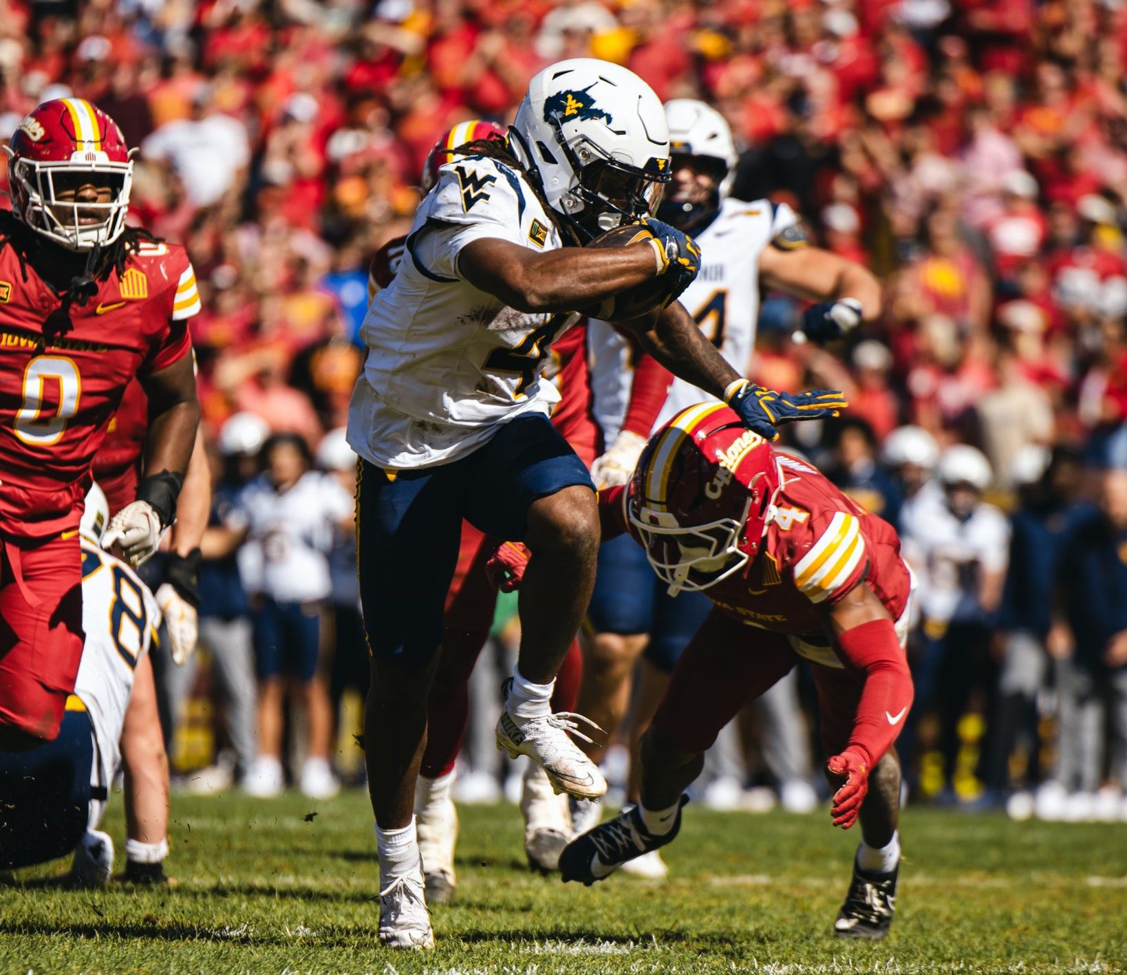 WVU Football RB Cam Cook against Iowa State