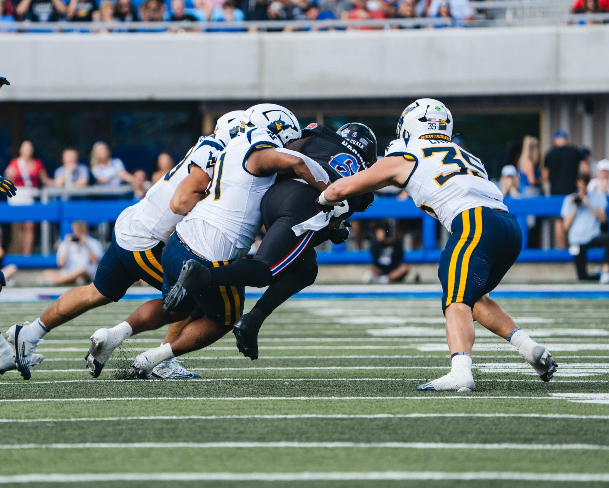 WVU Football making tackle at Kansas