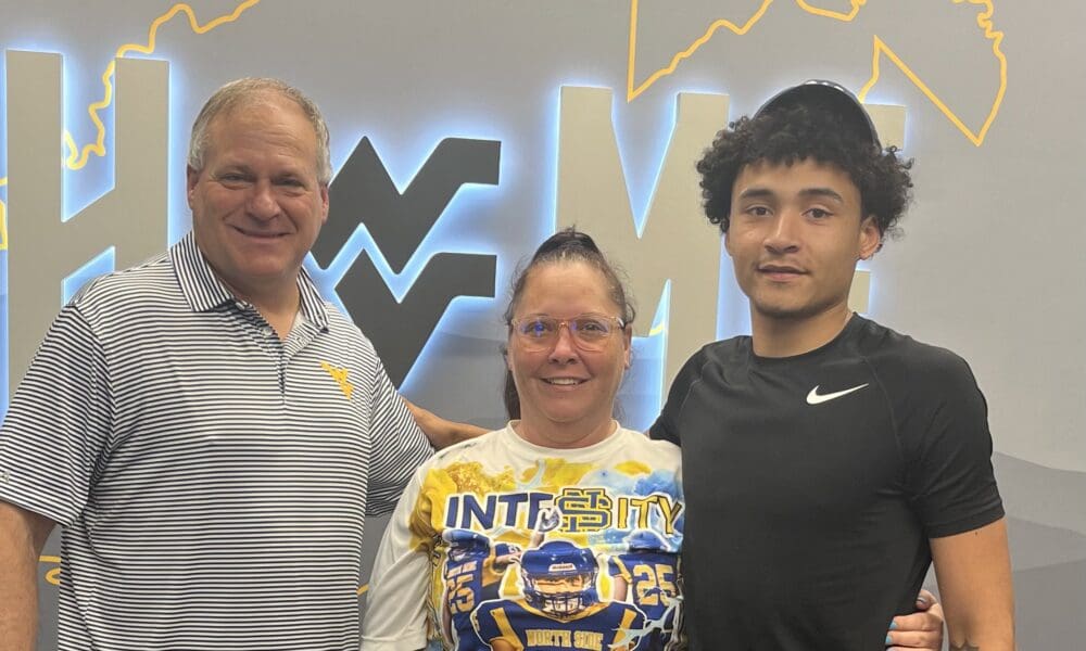 WVU Football recruit Javonte Smith and Rich Rodruguez